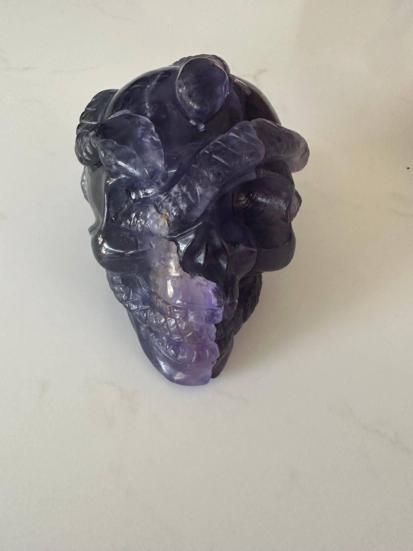 Rainbow Fluorite Snake Skull Carving
