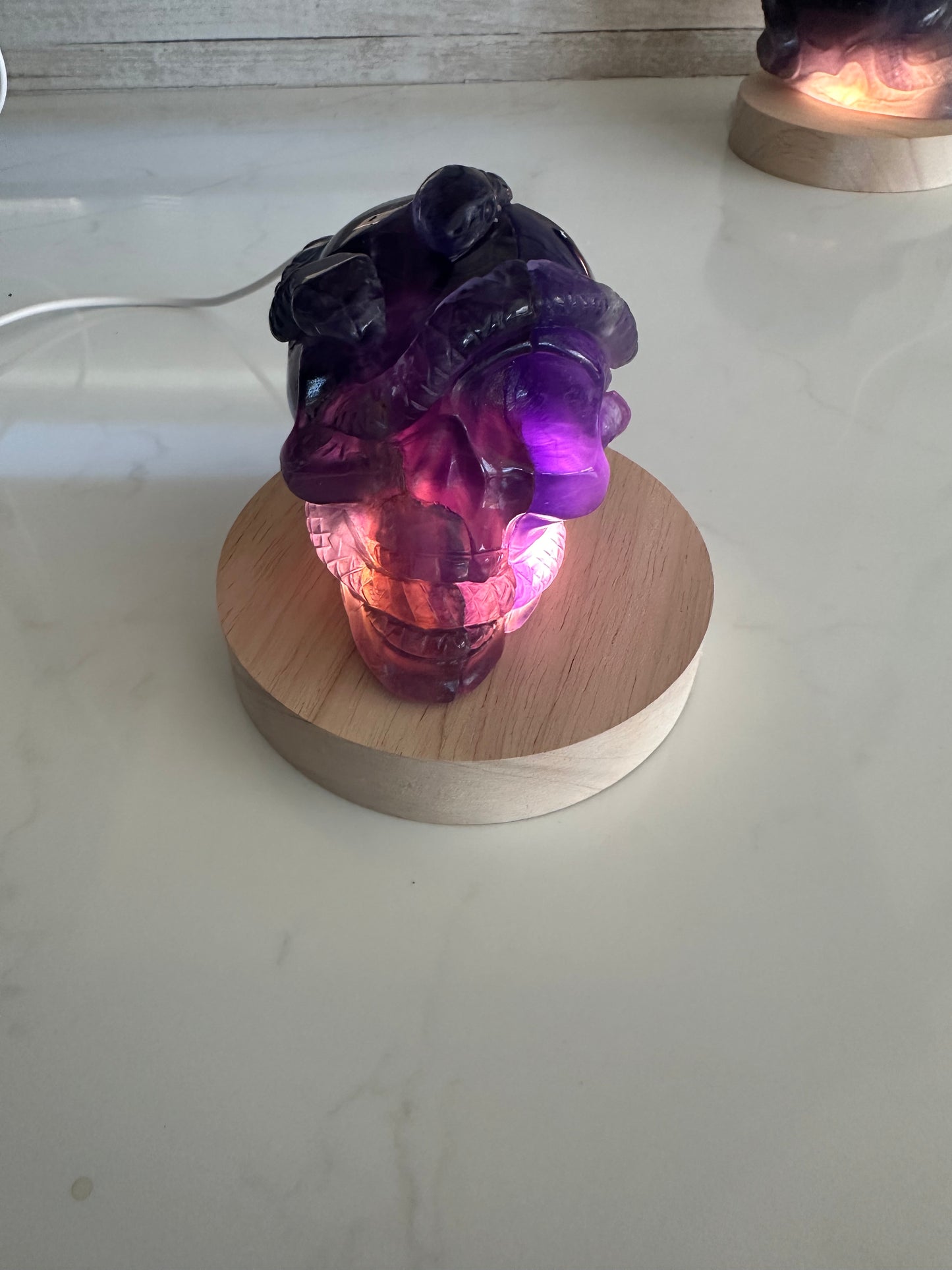 Rainbow Fluorite Snake Skull Carving