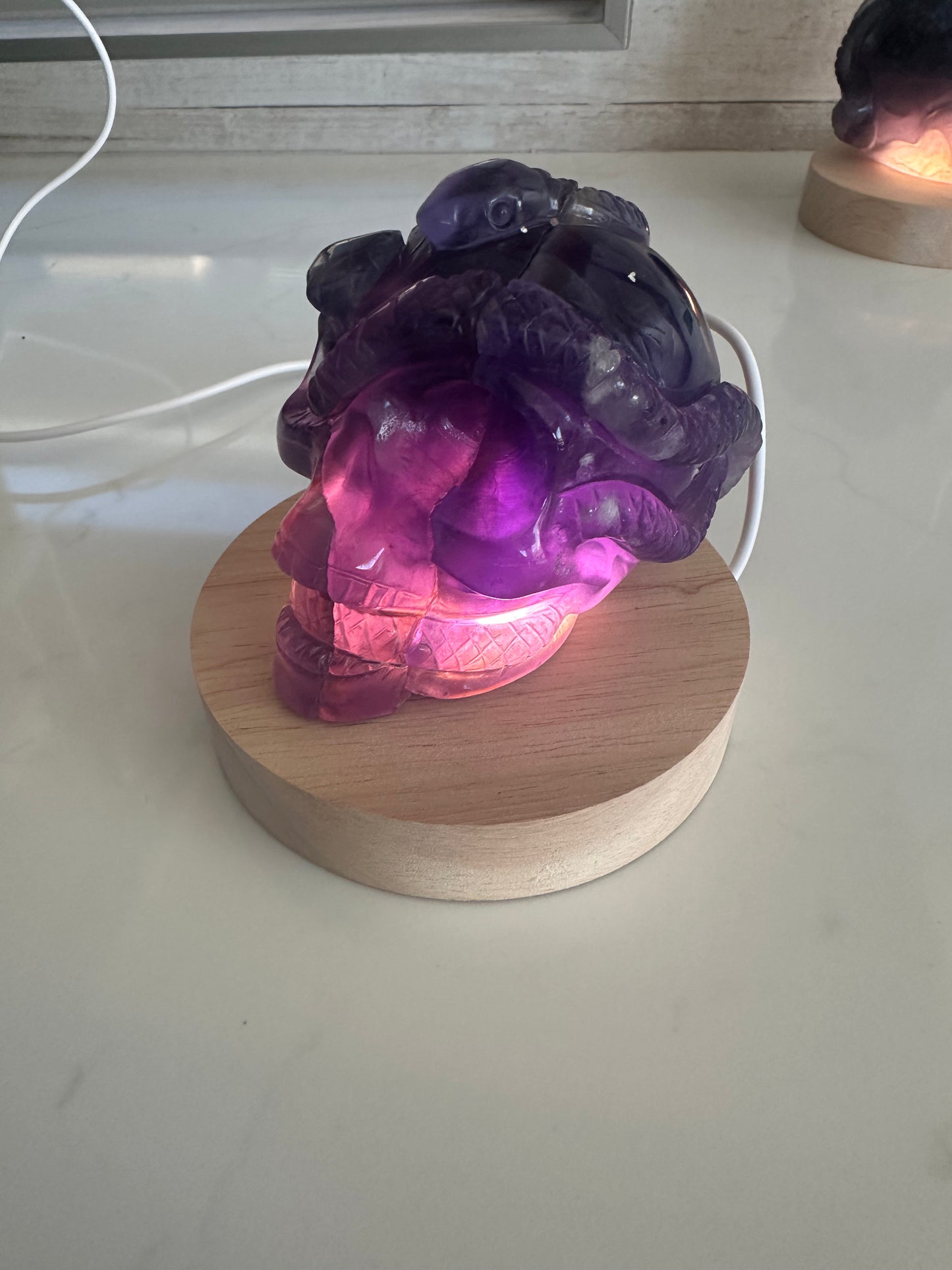 Rainbow Fluorite Snake Skull Carving