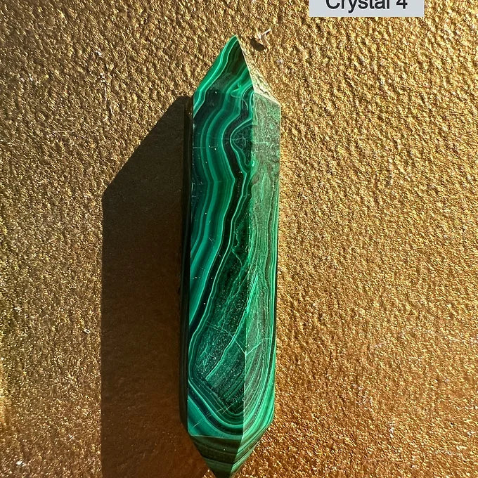 Double terminated malachite wands
