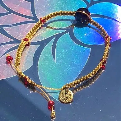 Garnet and Lotus Charm Bracelet